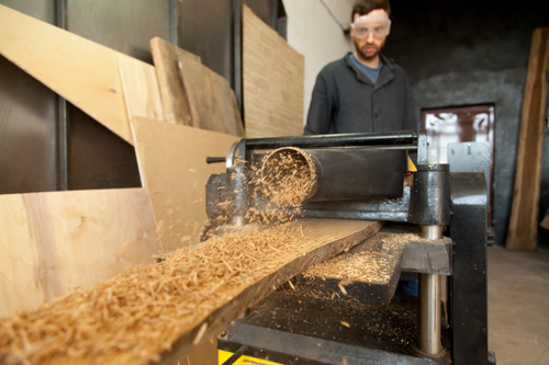 Carpenter-making-wood-dust